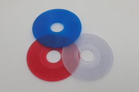 Three plastic records each 60mm in diameter.