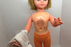 The doll has a speaker in the chest and start button for a bellybutton.