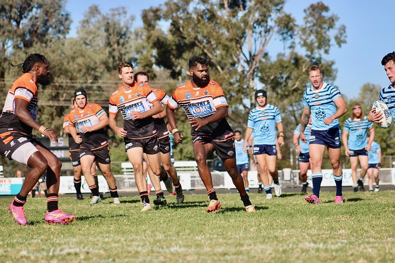 Loma Atuau, Jak Jeffrey, and Connor Elwood in the Tigers’ first grade’s win against Orange Hawks. Photos by The Nyngan Weekly: Abigail McLaughlin.