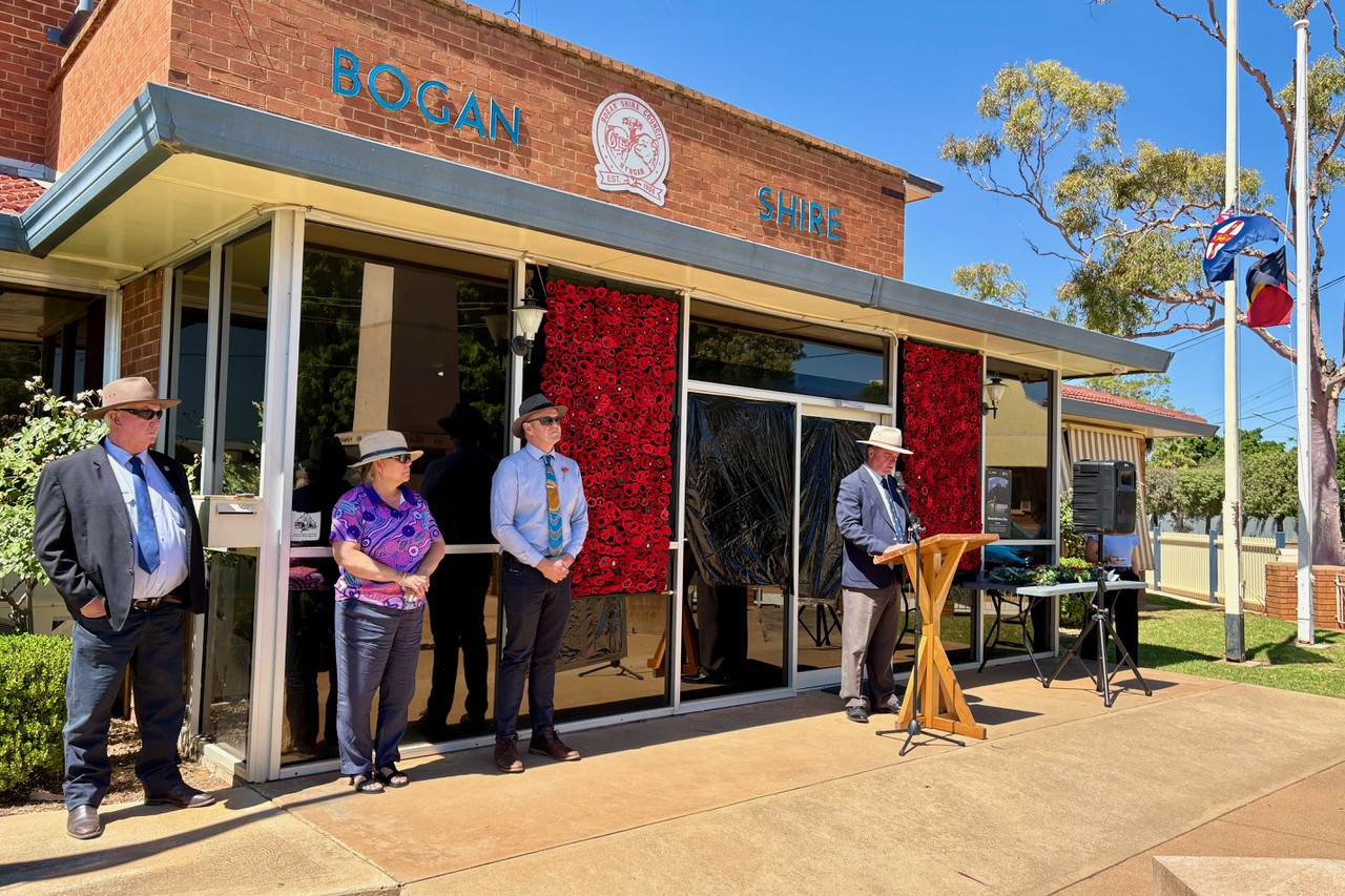 Bogan Shire Council mayor Glen Neill, Nyngan Local Aboriginal Land Council representative Marea Johnson, Pastor Richard Milligan, and president of the Nyngan RSL Sub-Branch Derek Francis at Nyngan Cenotaph for Remembrance Day. Photos by Warren and Nyngan Weekly: Abigail McLaughlin.