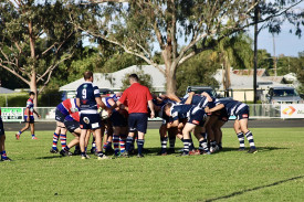 Halfback Simon Bell waiting to feed the ball into the scrum.