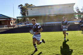 Bogan Bulls captain Brendan Nelson leads the team out