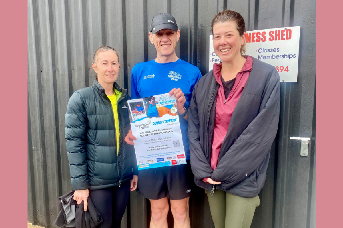 Nyngan runners Sonia Lane and Grace Wells-Budd with Rob Dickerson from the Dubbo Stampede. Photo by The Nyngan Weekly: Abigail McLaughlin.