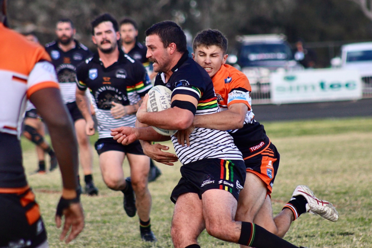 Will Black tackles Bathurst Panthers captain-coach Jake Betts in Black’s return to first grade from injury. Photos by The Nyngan Weekly: Abigail McLaughlin.