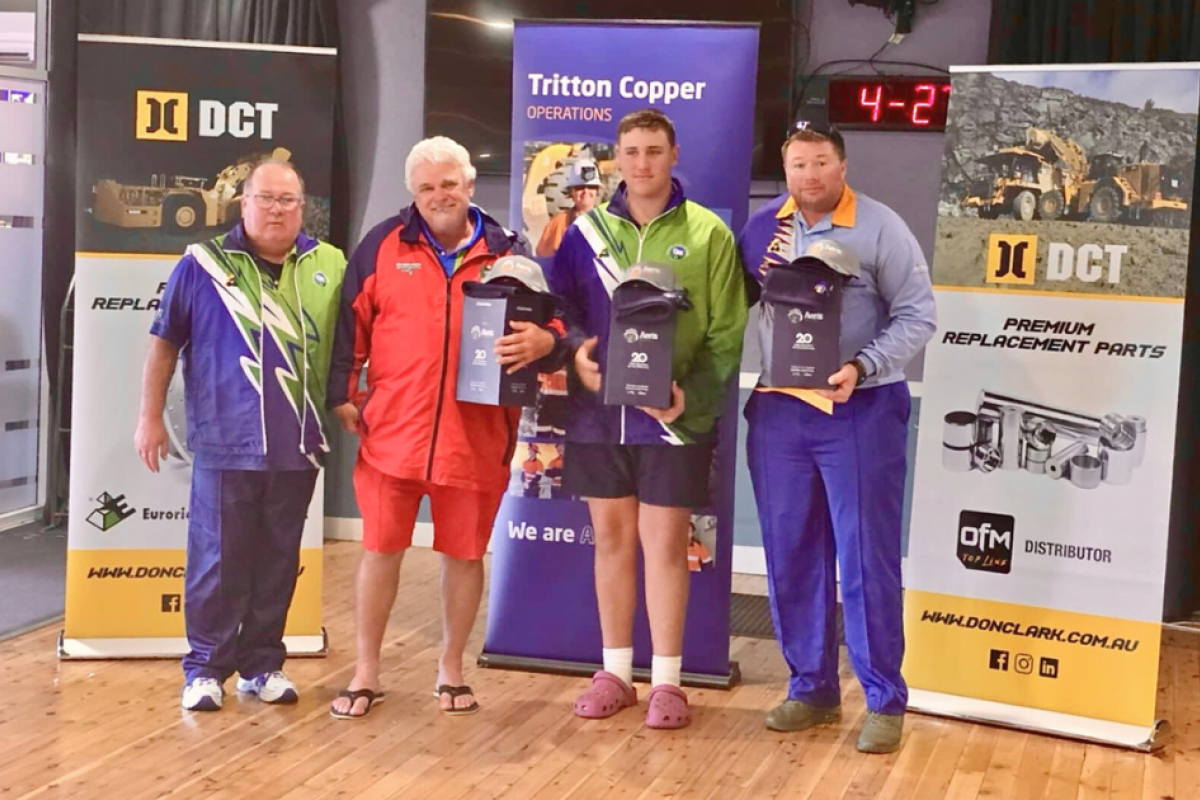 Nyngan BC president Mark Cashion presents the prizes to Nyngan Triples winners John “Fluffy” McIlwain, Tate Sinclair and Allen “George” Hemmings. Photos supplied.