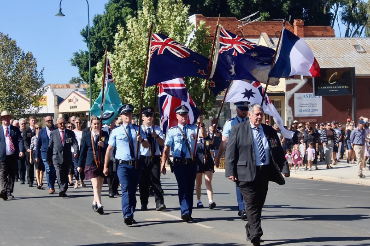 Mick Barlow leading the colour party during Nyngan’s 2025 ANZAC Day March. Photo by The Nyngan Weekly: Abigail McLaughlin.