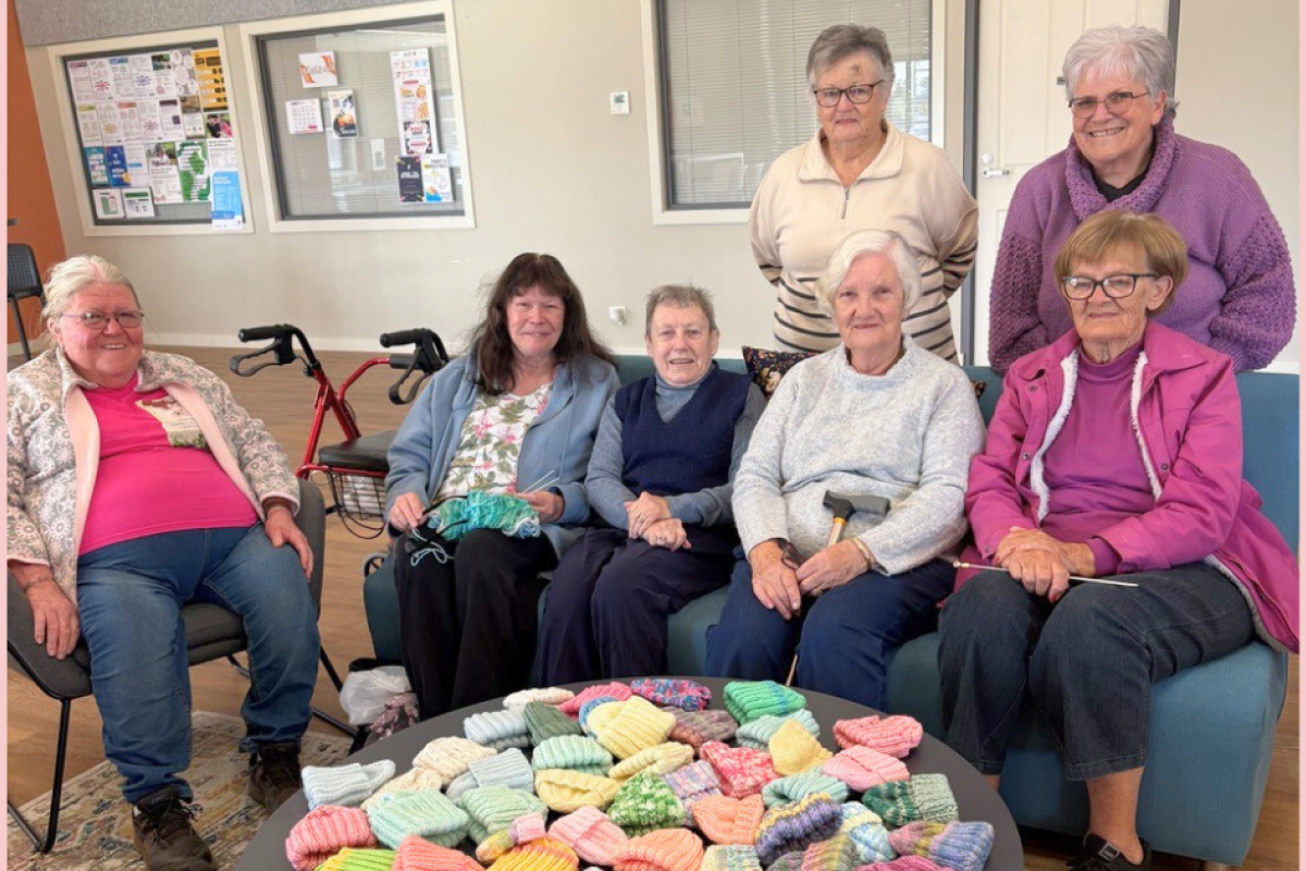 Members of the Nyngan craft group with Grace Chamberlain, Julie New, Patsy Midgley, Janet Hayden, Bev Patterson, Wendy Clissold and Margie Dunn who knitted more than 60 beanies for premature babies at Dubbo Base Hospital. Photo by The Nyngan Weekly: Abigail McLaughlin.